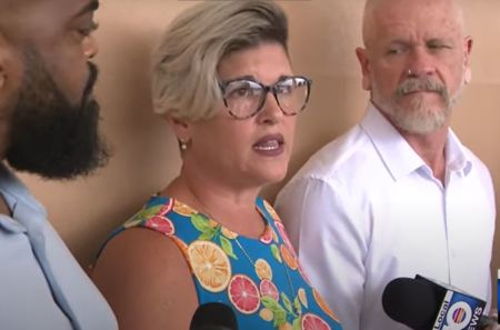 Jessica Norton speaks with reporters on July 31, 2024, after the Broward School Board in Florida voted to suspend her from her job after she lied on documents to allow her trans-identifying child to compete on a girls' volleyball team.