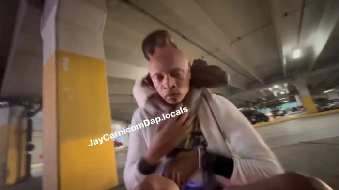 A bystander puts William Kemp-Neal into a chokehold after he was confronted by Dads Against Predators at a Target in Mount Vernon, New York, on July 8, 2024.