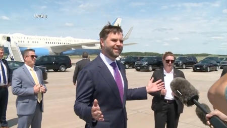 Sen. J.D. Vance, R-Ohio, speaks to the press gathered near Air Force Two at Chippewa Valley Regional Airport in Eau Claire, Wisconsin, on Aug. 7, 2024.