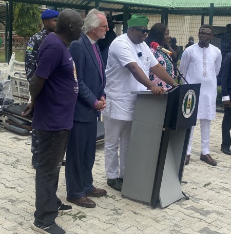 Plateau Gov. Caleb Mutfwang speaks at a press conference on Aug. 8 at the Plateau State Hospital. To his right are Pastor Bill Devlin (middle) and Emannuel Ogebe (left). 