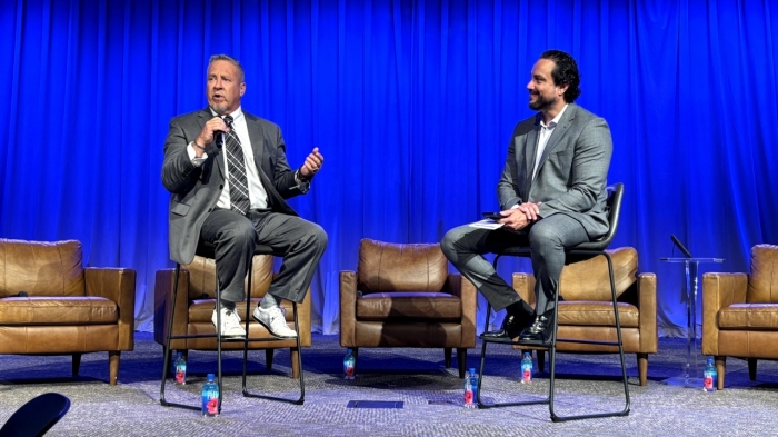 Coach Joe Kennedy, left, speaks with Christian Post reporter and podcaster Ian M. Giatti during a 'Politics in the Pews' event at Fellowship Church in Grapevine, Texas, on Aug. 27, 2024.