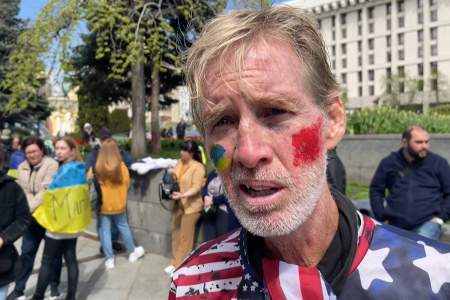 This screengrab taken from AFPTV on Sept. 16, 2024, shows Ryan Wesley Routh speaking during an interview at a rally to urge foreign leaders and international organizations to help provide humanitarian corridors for the evacuation of civilians and Ukrainian servicemen from Mariupol in central Kyiv on April 27, 2022, amid Russia's invasion of Ukraine. U.S. media said it was Routh, 58, who was arrested after U.S. Secret Service agents 'opened fire on a gunman' carrying an AK-47 style rifle near the boundary of Donald Trump's Florida golf course where the former president was golfing on Sept. 15, 2024.