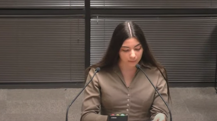 Former Athens Drive High School student Lorena Benson raises concerns about a sexually explicit book in her high school English class at a board of education meeting in Wake County, North Carolina, Sept. 17, 2024. 