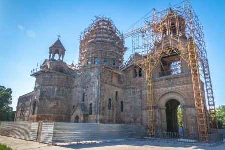 Exterior view of the Etchmiadzin Cathedral, the mother church of the Armenian Apostolic Church, in Vagharshapat (Etchmiadzin), the holy city and the religious center of Armenia. It was the first cathedral built in ancient Armenia, and is often considered the oldest cathedral in the world. The original church was built in the early 4th century, by Armenia's patron saint Gregory the Illuminator, following the adoption of Christianity as a state religion by King Tiridates III.