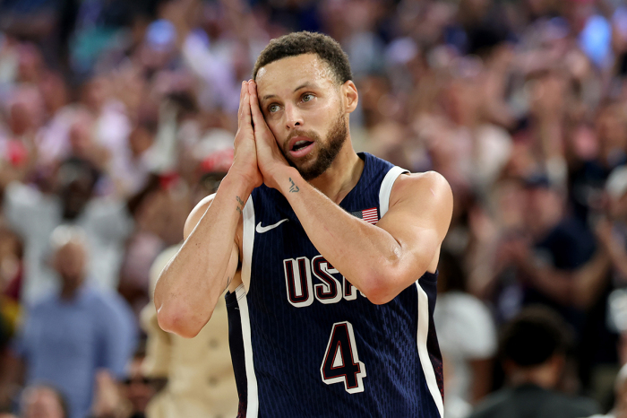 Stephen Curry #4 of Team United States reacts after a 3-point basket during the Men's Gold Medal game between Team France and Team United States on day 15 of the Olympic Games in Paris at Bercy Arena on Aug. 10, 2024, in Paris, France. 