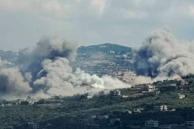 Smoke billows from the site of an Israeli air strike in the Lebanese village of Jibal el Botm, near the Lebanon-Israel border, on September 23, 2024. The Israeli military on September 23 told people in Lebanon to move away from Hezbollah targets and vowed to carry out more 'extensive and precise' strikes against the Iran-backed group. 