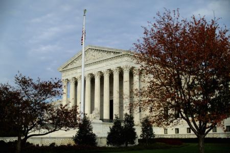 The U.S Supreme Court building is framed by fall foliage on Nov. 6, 2015, in Washington, D.C. 