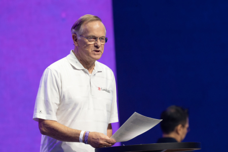 Theologian Chris Wright introduces plenary speakers at the Fourth Lausanne Congress on World Evangelization in Incheon, South Korea, on Sept. 23, 2024.