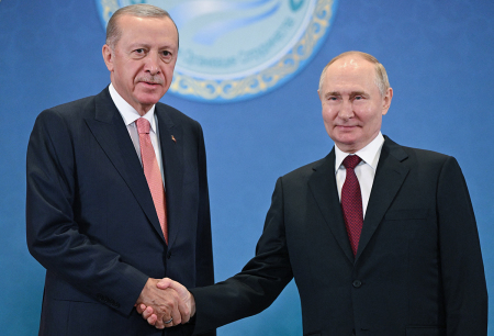 In this pool photograph distributed by the Russian state agency Sputnik, Russia's President Vladimir Putin meets with Turkey's President Recep Tayyip Erdogan on the sidelines of the Shanghai Cooperation Organization (SCO) member states leaders' summit in Astana on July 3, 2024. 