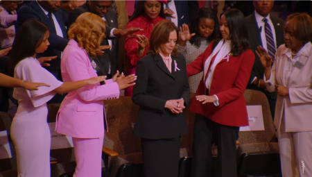 Vice President Kamala Harris, who is also the Democratic presidential nominee, receives prayer at New Birth Missionary Baptist Church in Stonecrest, Ga., on Oct. 20, 2024.