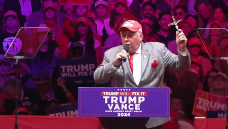 David Rem, a 60-year-old sanitation worker in New York City, speaks at a Trump campaign rally at Madison Square Garden on Oct. 27, 2024. 