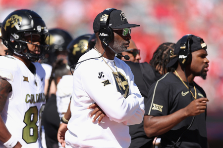 Head coach Deion Sanders of the Colorado Buffaloes watches from the sidelines during the first half of the NCAAF game against the Arizona Wildcats at Arizona Stadium on Oct. 19, 2024, in Tucson, Arizona. 