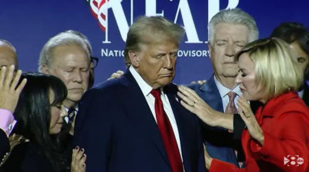 Christian leaders pray over former President Donald Trump during the National Faith Summit in Powder Springs, Georgia on Oct. 28.