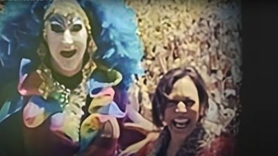 Then-California Sen. Kamala Harris (R) poses with a member of the Sisters of Perpetual Indulgence during a 2019 San Francisco pride event. 