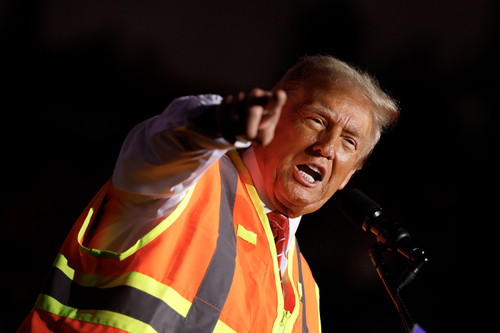 Republican presidential nominee, former President Donald Trump speaks during a campaign event at the Resch Center on Oct. 30, 2024, in Green Bay, Wisconsin. With less than a week until Election Day, Trump continues to campaign in the battleground swing states. 