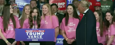 Members of the Roanoke College women's swimming Team appear on stage with former President Donald Trump at a rally in Salem, Virginia, Nov. 2, 2024. 