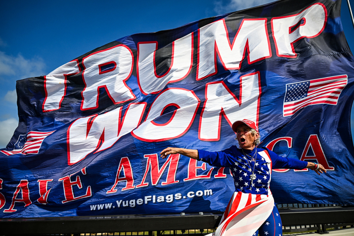 Supporters of former U.S. President and Republican presidential candidate Donald Trump celebrate his victory near his Mar-a-Lago resort in Palm Beach, Florida, on Nov. 6, 2024. Donald Trump won a sweeping victory Wednesday in the U.S. presidential election, defeating Kamala Harris to complete a historic political comeback. 