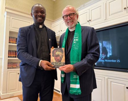 Father Stephen Ojapah (L) with Pastor William Devlin (R) at the Religious Freedom Roundtable briefing on Nov. 25, 2024, at the National Affairs Office of The Church of Scientology in Washington, D.C.