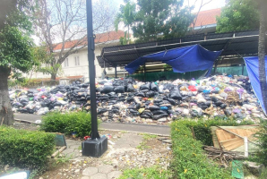 Authorities allow 2 years' worth of uncollected garbage to pile up near church