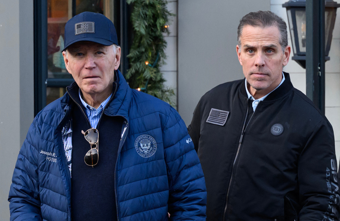 A Nov. 29, 2024, photo shows U.S. President Joe Biden and his son, Hunter Biden, stepping out of a bookstore while shopping in Nantucket, Massachusetts, on Nov. 29, 2024. Biden on Sunday issued an official pardon for his son Hunter, who is facing sentencing for two criminal cases related to tax evasion and the purchase of a firearm.