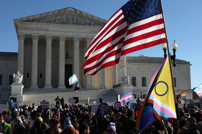 Trans activists, supporters and opponent rally outside of the U.S. Supreme Court as the high court hears arguments in a case on transgender health rights on Dec. 04, 2024, in Washington, D.C. The Supreme Court is hearing arguments in U.S. v. Skrmetti, a case about Tennessee's law banning puberty blockers, cross-sex hormones and body-mutilating sex-changes surgeries for minors and if it violates the U.S. Constitution’s equal protection guarantee.