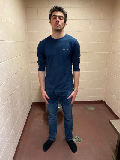 In this handout photo released by the Altoona Police Department, Luigi Mangione is seen in a holding cell after being taken into custody on Dec. 9, 2024, in Altoona, Pennsylvania.