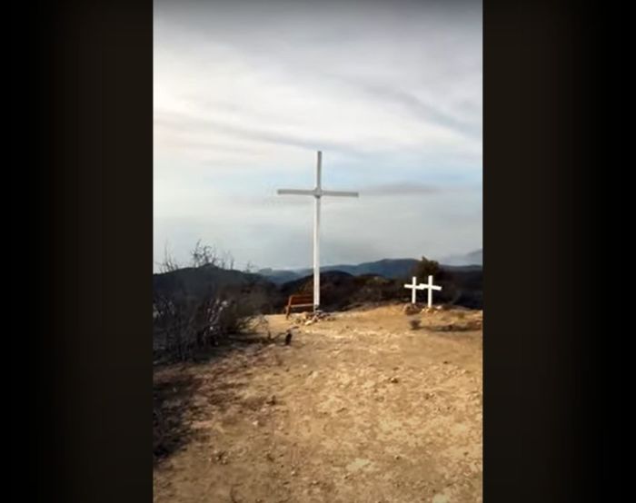 A 20-foot tall white cross overlooking Pepperdine University in California survives the Franklin Fire, which began on Dec. 9, 2024, and destroyed over 4,000 acres. 