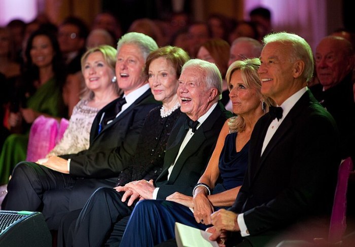 From left, former first lady Hillary Rodham Clinton, former President Bill Clinton, former first lady Rosalynn Carter, former President Jimmy Carter, first lady Jill Biden, and then-Vice President Joe Biden listen to performers during the State Dinner reception in the East Room of the White House, on Jan. 19, 2011. 