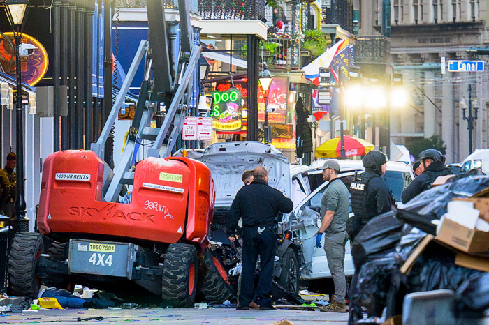 Police investigators surround a white truck that has been crashed into a work lift in the French Quarter of New Orleans, Louisiana, on Jan. 1, 2025. At least 10 people were killed and 30 injured Wednesday when a vehicle plowed into a New Year's crowd in the heart of the thriving New Orleans tourist district around 3:15 a.m. Central time, authorities in the southern U.S. city said. 