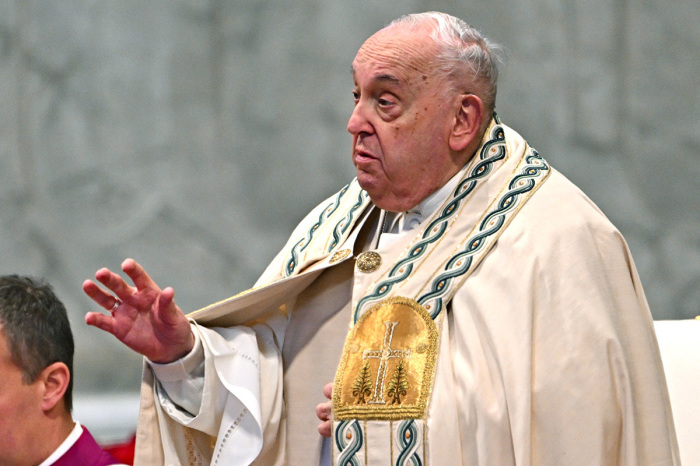 Pope Francis gestures as he celebrates New Year's Day during a Mass on World Day of Peace in Saint-Peter's Basilica at the Vatican on Jan. 1, 2025.