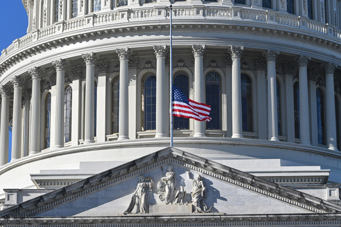 The U.S. flag flies at half-staff at the U.S. Capitol in honor of former U.S. President Jimmy Carter, in Washington, D.C. on Dec. 30, 2024. Carter, the 100-year-old former president and Nobel peace laureate who rose from humble beginnings in rural Georgia to lead the nation from 1977 to 1981, has died, his nonprofit foundation said on Dec. 29, 2024. 