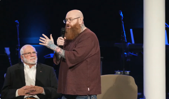 Todd Bentley details what he described as a near-death experience he had during a medical emergency last November while speaking at a New Years Eve service at MorningStar Ministries in Fort Mill, South Carolina, as founder Rick Joyner listens intently on Dec. 31, 2024.