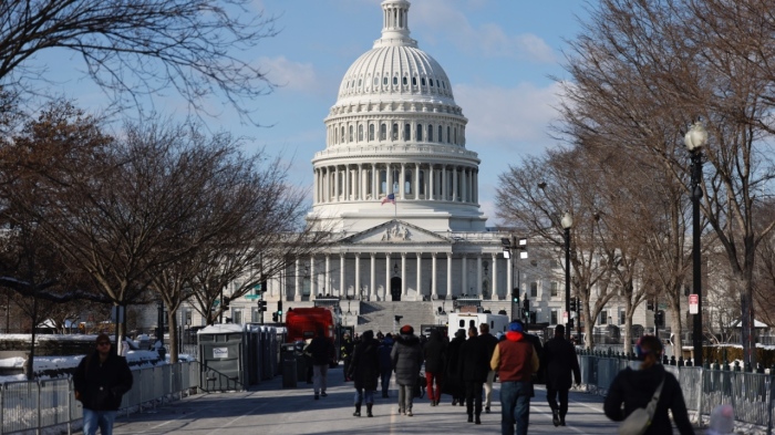 Members of the public arrive to view the flag-draped casket of former President Jimmy Carter lying in state in the U.S. Capitol Rotunda in Washington, D.C., on Jan. 8, 2025.