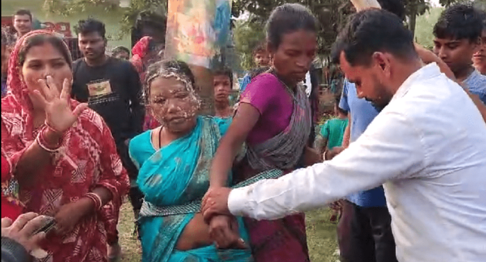 Hindu nationalists tied Subhasini Singh and Sukanti Singh (R) to a tree in Chhankhanpur village, Odisha state, India, on Dec. 26, 2024. 