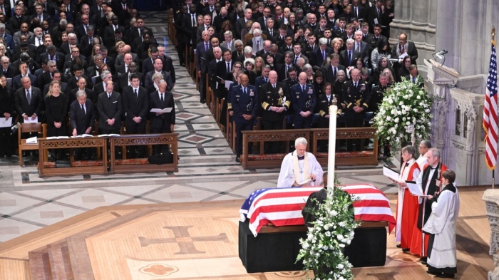 Members of the clergy pray over the casket of former President Jimmy Carter during his funeral at the Washington National Cathedral in Washington, D.C., on Jan. 9, 2025.