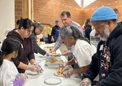 Volunteers make burritos as part of a 2024 Martin Luther King Jr. Day of Service event held at Thompson Memorial Presbyterian Church of New Hope, Pennsylvania.