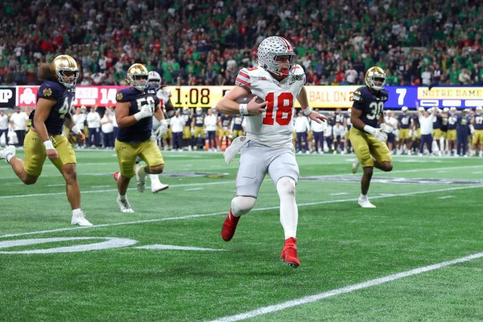 Will Howard #18 of the Ohio State Buckeyes runs with the ball during the second quarter against the Notre Dame Fighting Irish in the 2025 CFP National Championship at the Mercedes-Benz Stadium on Jan. 20, 2025 in Atlanta, Georgia. 