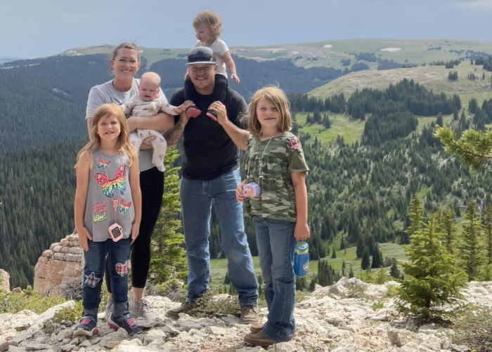 Tranyelle Harshman pictured with her widower, Cliff Harshman, and her four daughters.