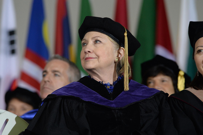 Hillary Clinton listens during commencement at Wellesley College May 26, 2017, in Wellesley, Massachusetts. Clinton graduated from Wellesley College in 1969.