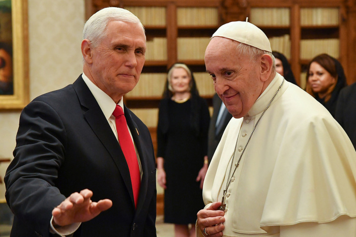 Pope Francis speaks with former Vice President Mike Pence during a private audience at the Vatican, Jan. 24, 2020. 