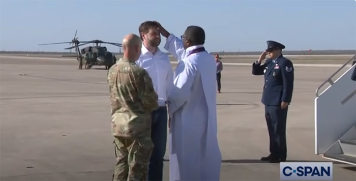 Before departing Texas after visit to Southern border with Mexico, a priest gives Vice President JD Vance ashes for Ash Wednesday on March 5, 2025. 