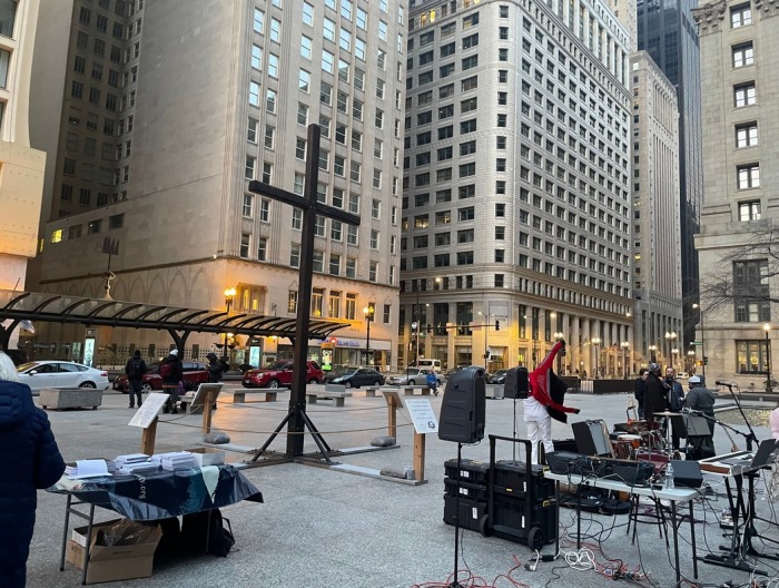 A large wooden cross is set to go up in Chicago's Dealy Plaza.