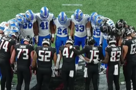 Lions, Falcons huddle in prayer as ambulance takes injured Morice Norris off field