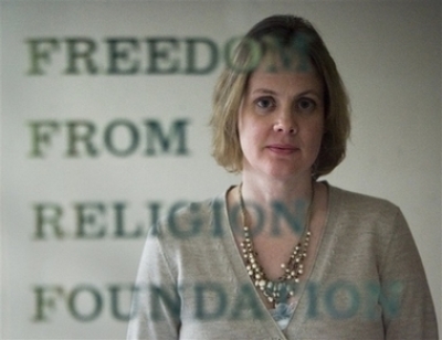 Freedom From Religion Foundation Co-President Annie Laurie Gaylor stands in front of the door at the foundation headquarters Thursday, Jan. 25, 2007, in Madison, Wisconsin. Gaylor has helped transform the Madison-based Freedom From Religion Foundation from obscurity into the nation's largest group of atheists and agnostics, with a fast-rising membership and increasing legal clout.