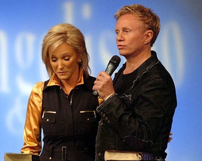 Randy and Paula White tell worshippers at Without Walls International Church in Tampa, Fla., that they are divorcing at a night service on Thursday, August 23, 2007.