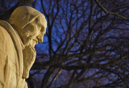 Jean Calvin's statue at Geneva's Reformation Wall, a 100 meters long monument depicting Protestant figures from across Europe.