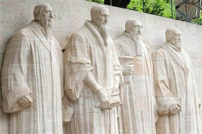 A view of the Reformation Wall with statues of William (Guillaume) Farel, John (Jean) Calvin, Theodore de Beze, and John Knox, from left to right, at Bastion Park in Geneva, Switzerland, Friday, June 19, 2009. The commemorations of the 500th anniversary of John Calvin's birth has started in Geneva. Calvin was a principal figure in the development of the system of Christian theology later called Calvinism.