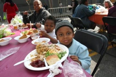 A child eats a Thanksgiving meal served by Union Rescue Mission in Los Angeles, Saturday, Nov. 21, 2009. Union Rescue Mission hosts an annual Thanksgiving Celebration on Skid Row, serving thousands of meals.