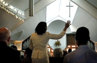 A parishioner listens to a service at the Ebenezer Baptist Church in which the Rev. Raphael Warnock encouraged people to go out and vote in Tuesday's midterm elections Sunday, Oct. 31, 2010, in Atlanta, Georgia.