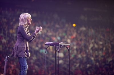 Popular speaker and author Beth Moore tells the 22,000 students at Passion 2011 that they need to control their mind and set their focus on God during her morning session on Sunday, Jan. 2, 2011, in Atlanta, Georgia.